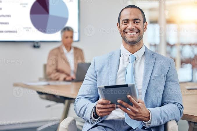 Professional trader with tablet in office